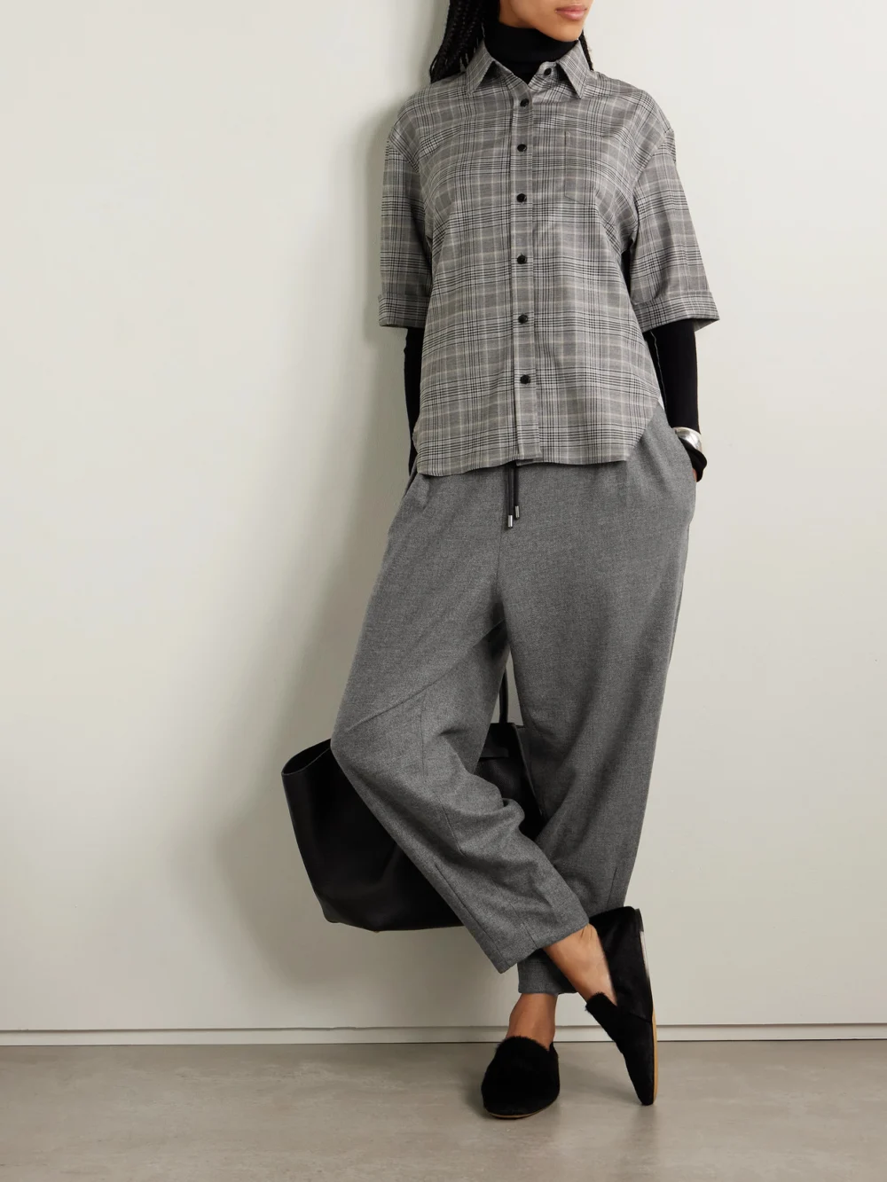 Maria McManus Pleated Stretch-wool and Cashmere-blend Tweed Tapered Pants, worn by a model
