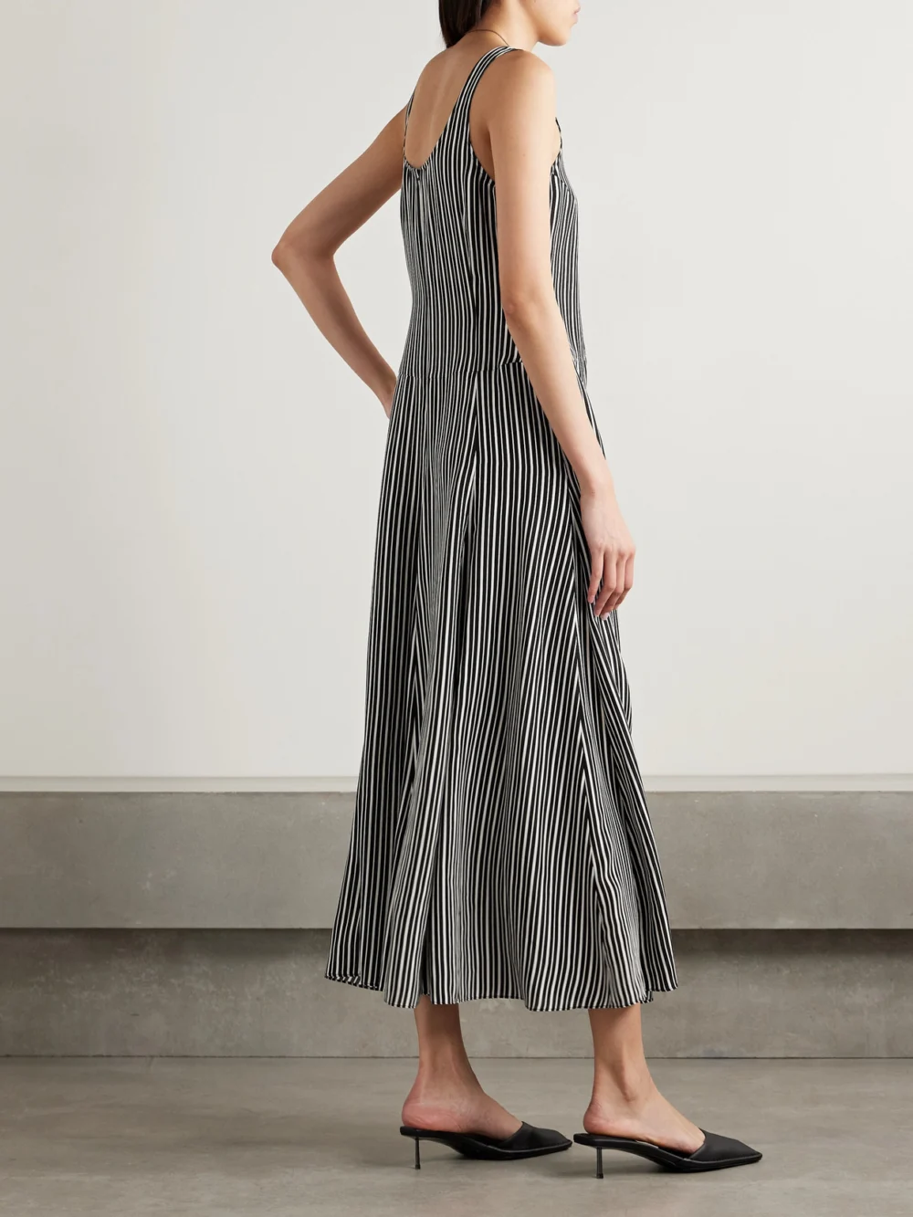 Back view of the Maria McManus Pleated Striped Recycled-crepe De Chine Midi Dress