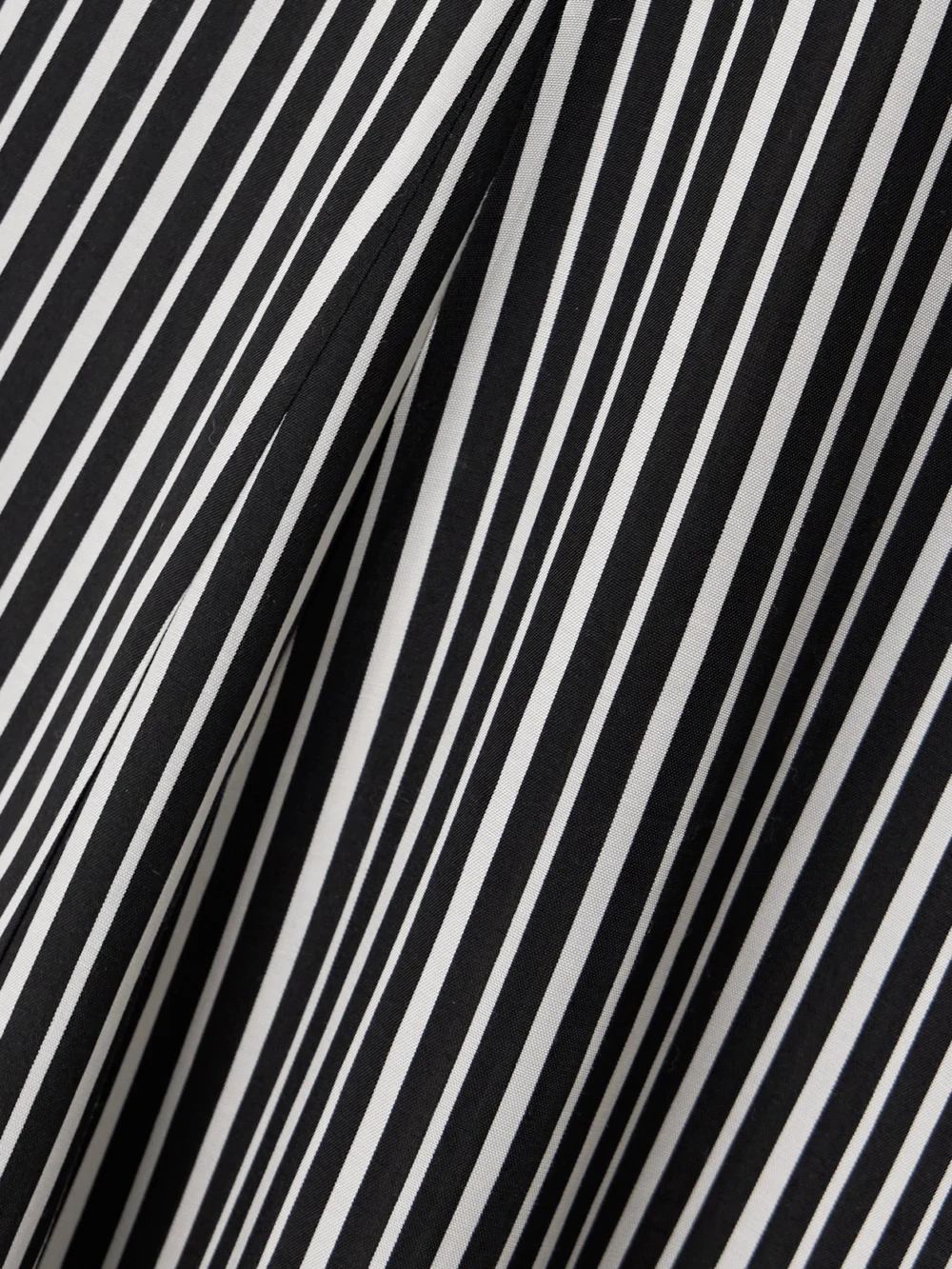 Close-up detail of the Maria McManus Pleated Striped Recycled-crepe De Chine Midi Dress