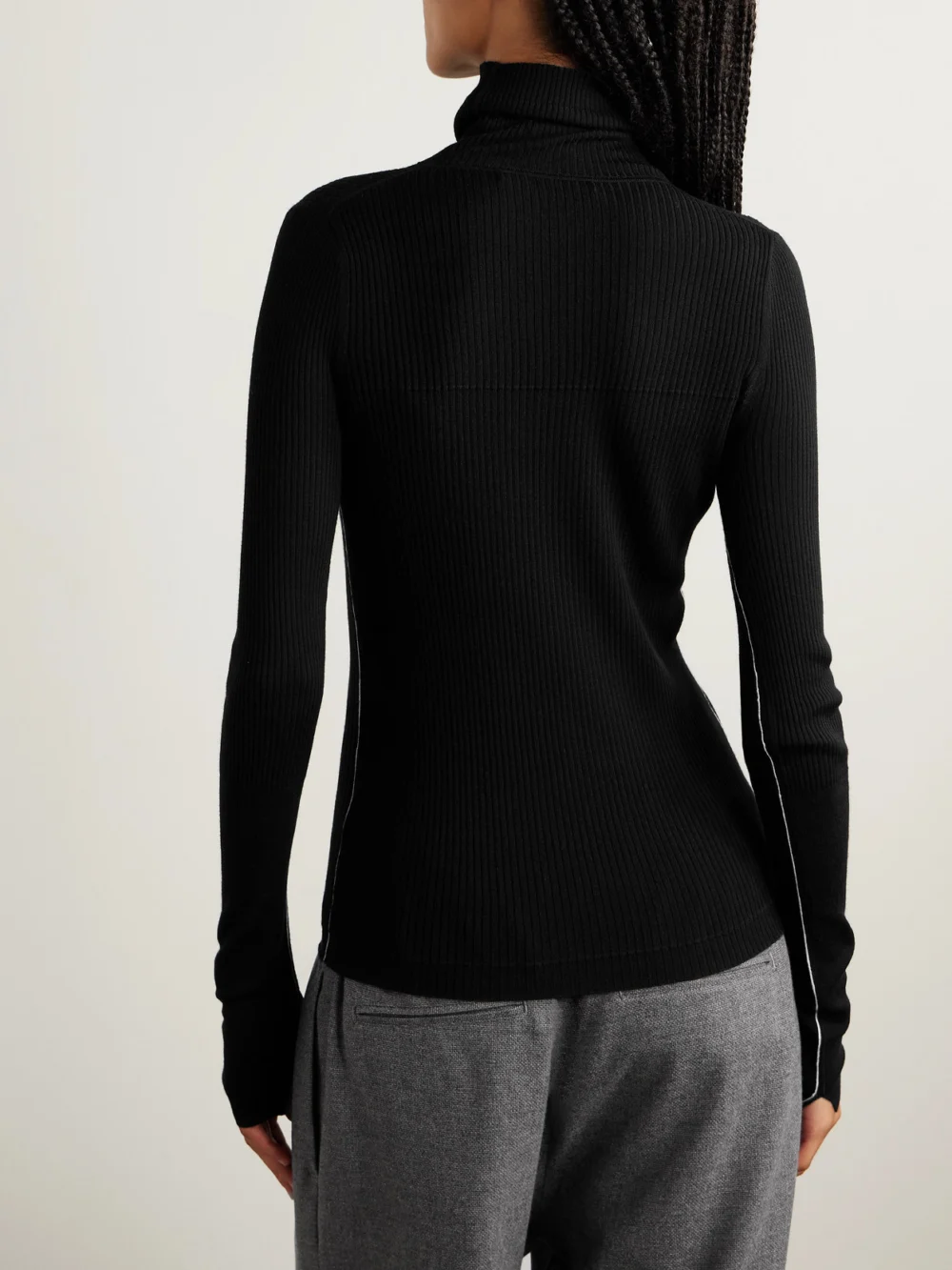 Back view of the Maria McManus Ribbed Merino Wool Turtleneck Sweater