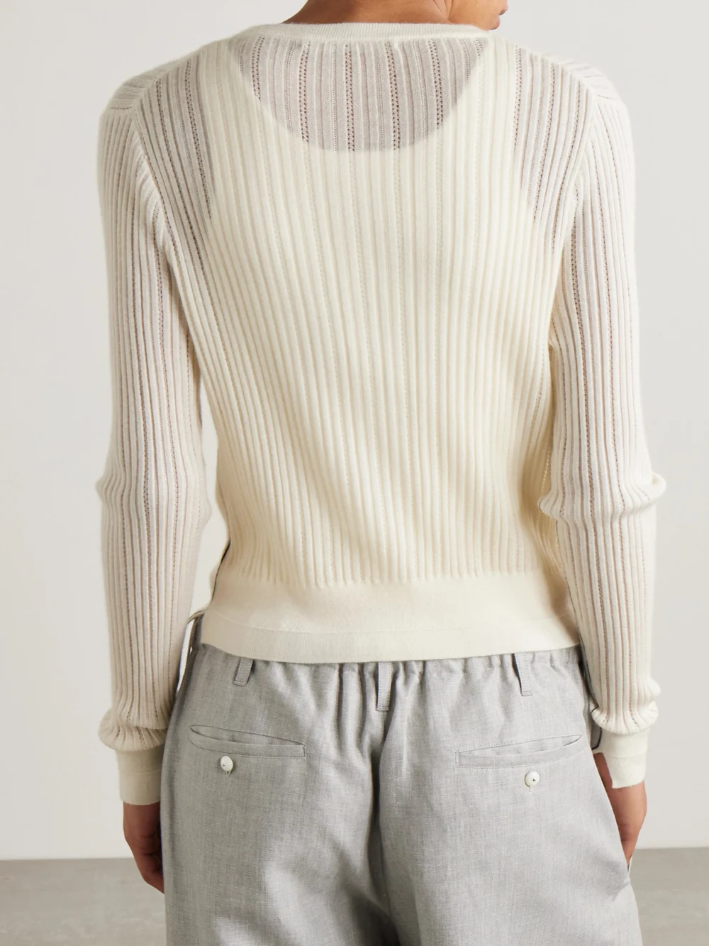 Back view of the Maria McManus Ribbed Pointelle-knit Merino Wool Cardigan