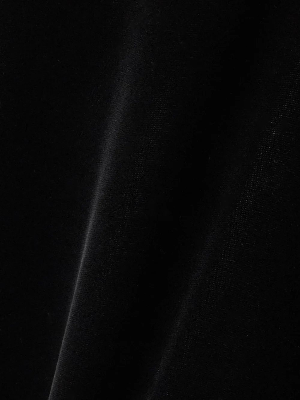 Close-up detail of the Marie Adam-Leenaerdt Asymmetric Velvet Maxi Skirt