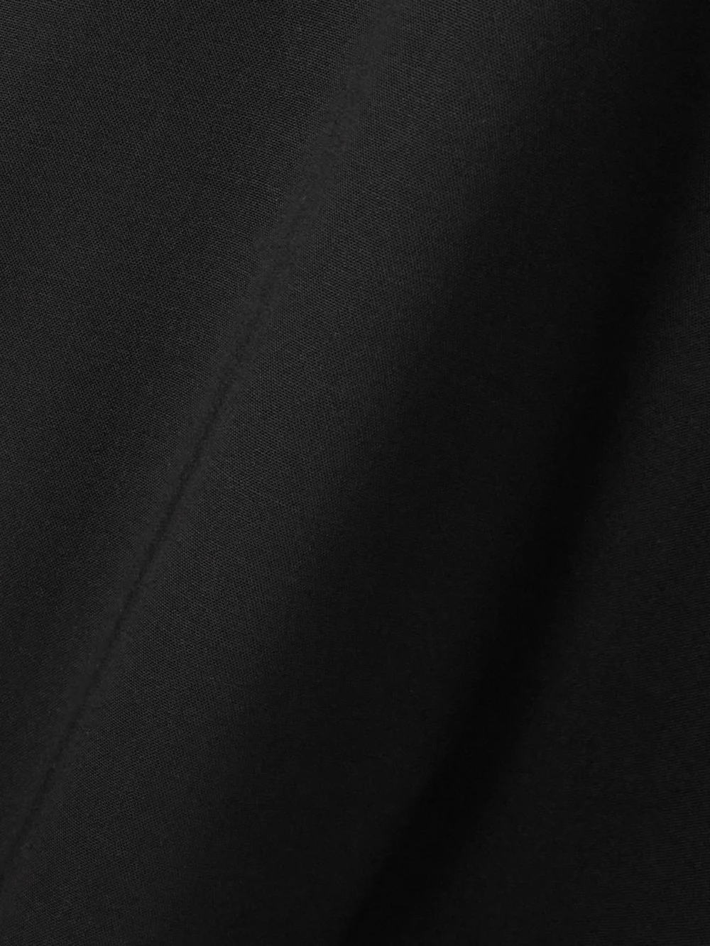 Close-up detail of the Marie Adam-Leenaerdt Cutout Wool Halterneck Maxi Dress