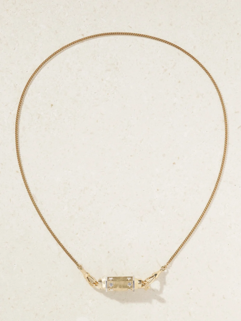 Close-up detail of the Marie Lichtenberg Star Baby Locket 18-karat Yellow and White Gold Necklace
