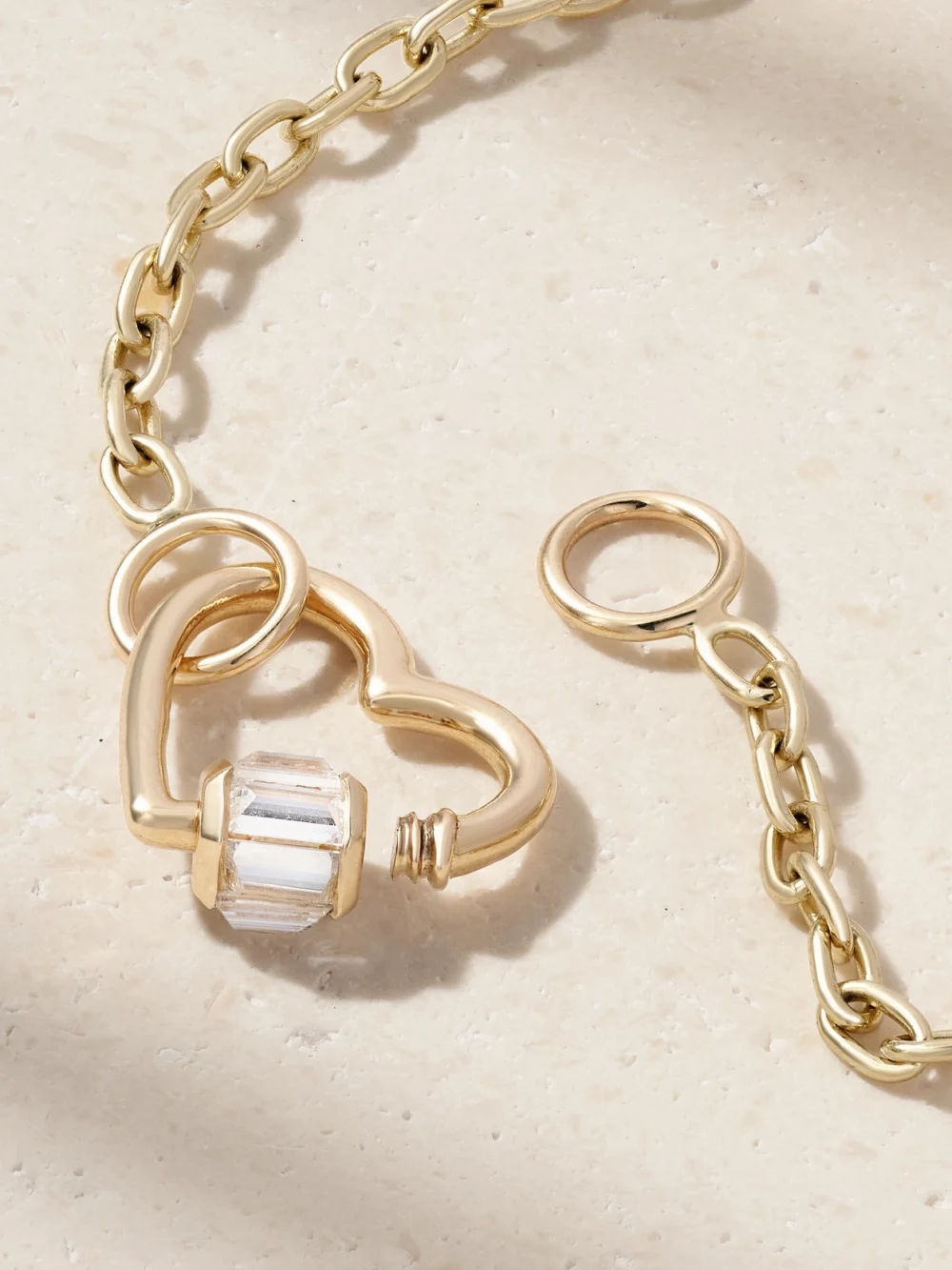 Back view of the Marla Aaron Baguette Baby Heart Lock + Pulley Chain 14-karat Gold Diamond Bracelet