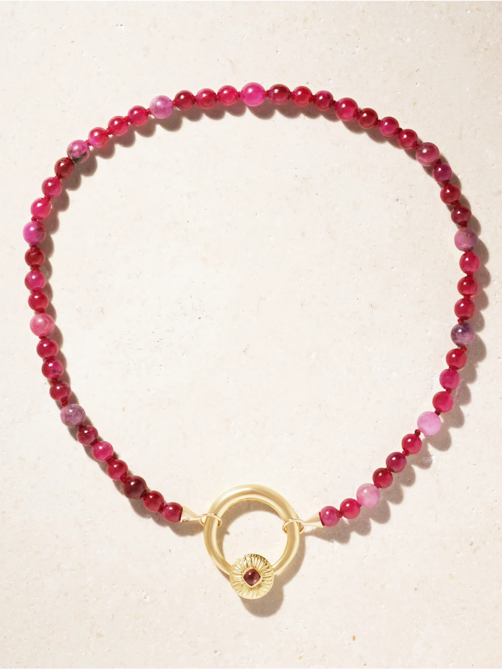 Close-up detail of the Marla Aaron Flower Musgrave Lock 14-karat Gold, Ruby and Spinel Necklace