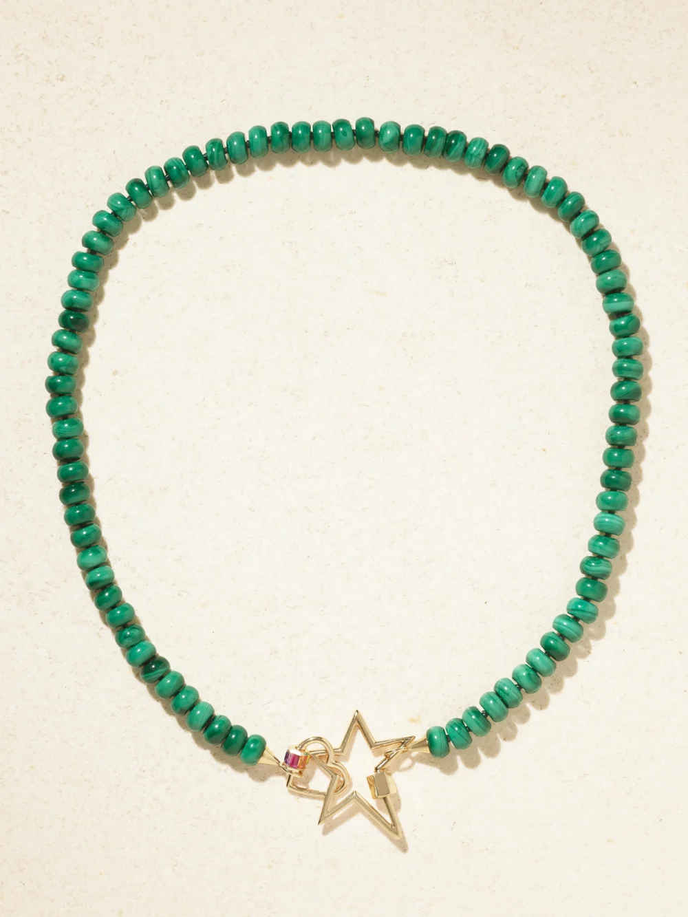Close-up detail of the Marla Aaron Heartlock + Starlock 14-karat Gold Multi-stone Necklace