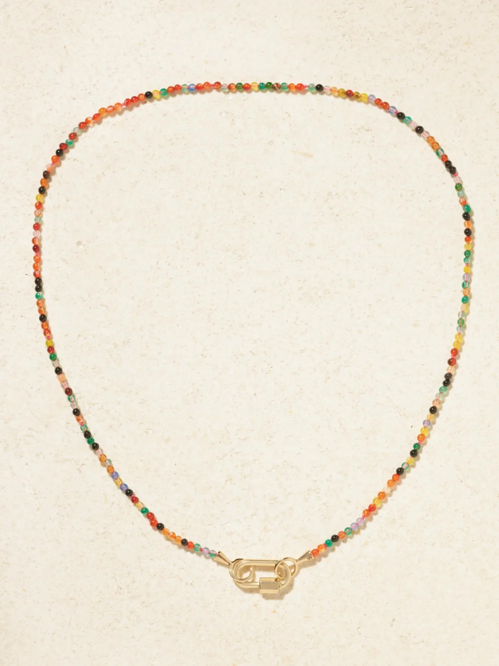 Close-up detail of the Marla Aaron Itty Bitty Strand + Babylock 14-karat Gold Agate Necklace