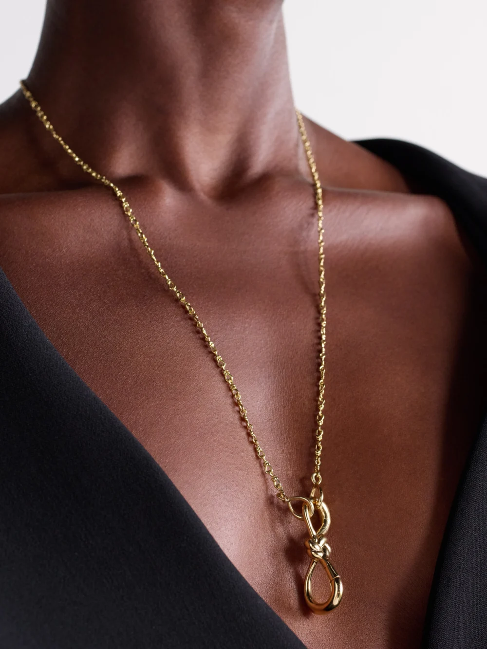 Marla Aaron Small True Lover's Knot Lock + Chain 18-karat Gold Necklace, styled view