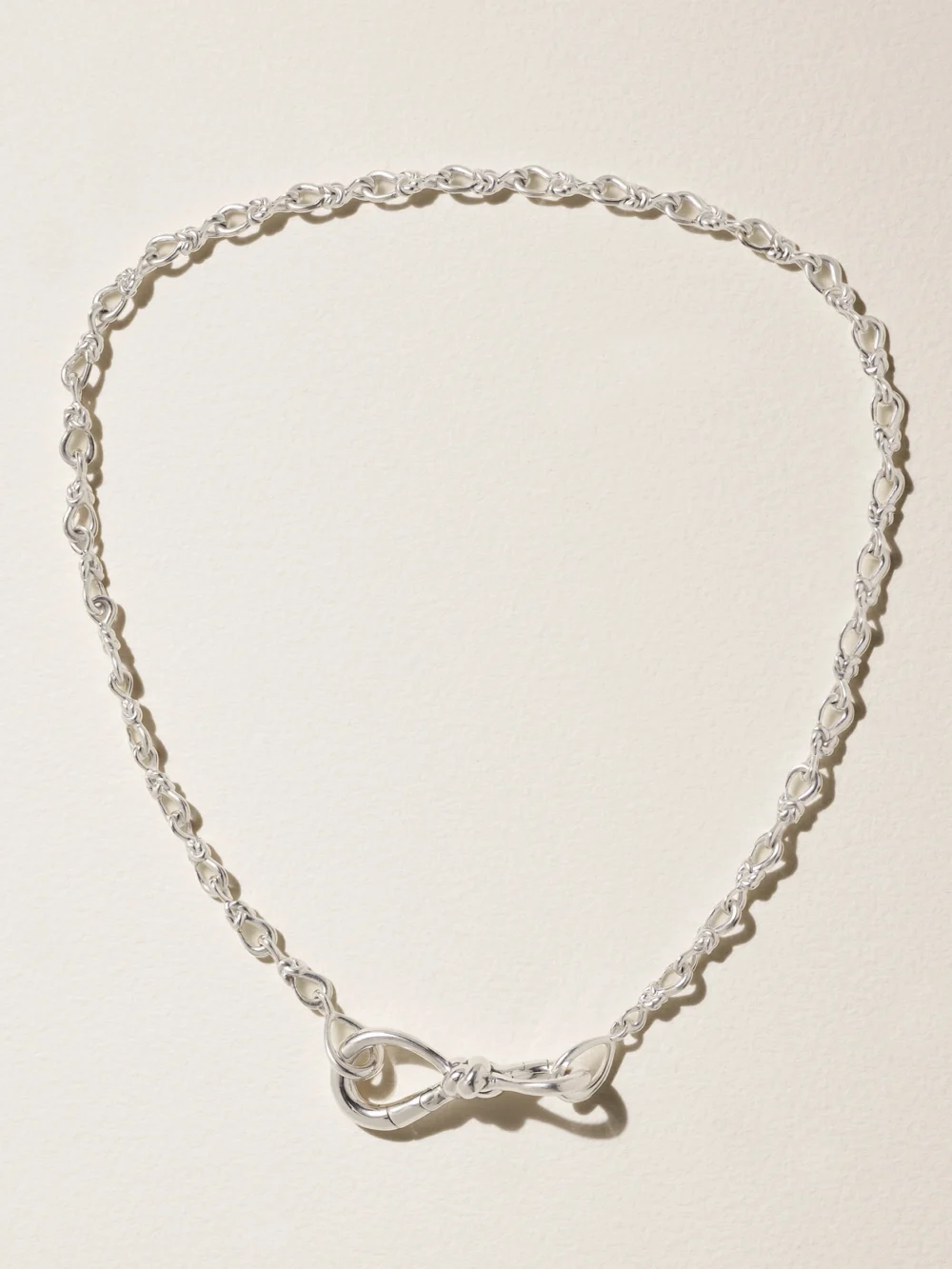 Close-up detail of the Marla Aaron True Lover's Knot Sterling Silver Necklace