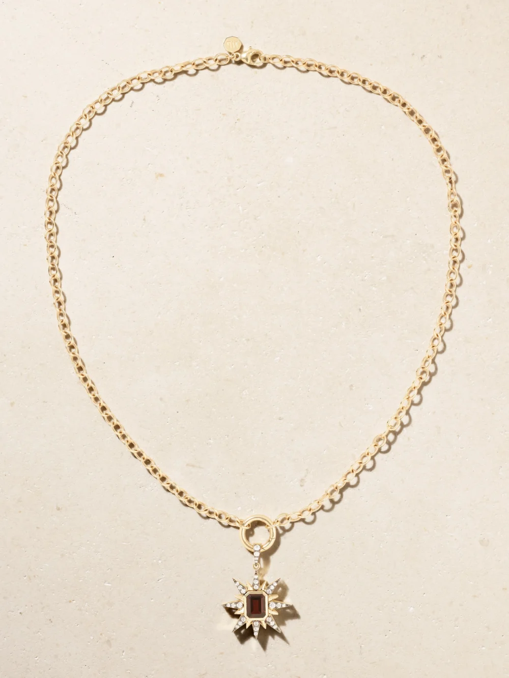 Close-up detail of the Marlo Laz Starburst 14-karat Gold, Rhodium-plated, Diamond and Garnet Necklace