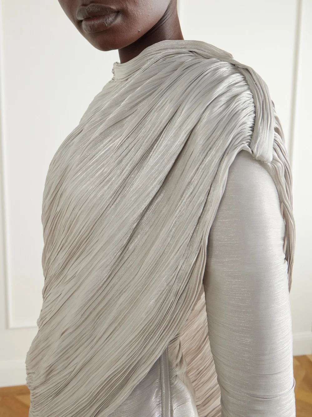 Close-up detail of the Marmar Halim Cape-effect Plissé Crepe De Chine Gown