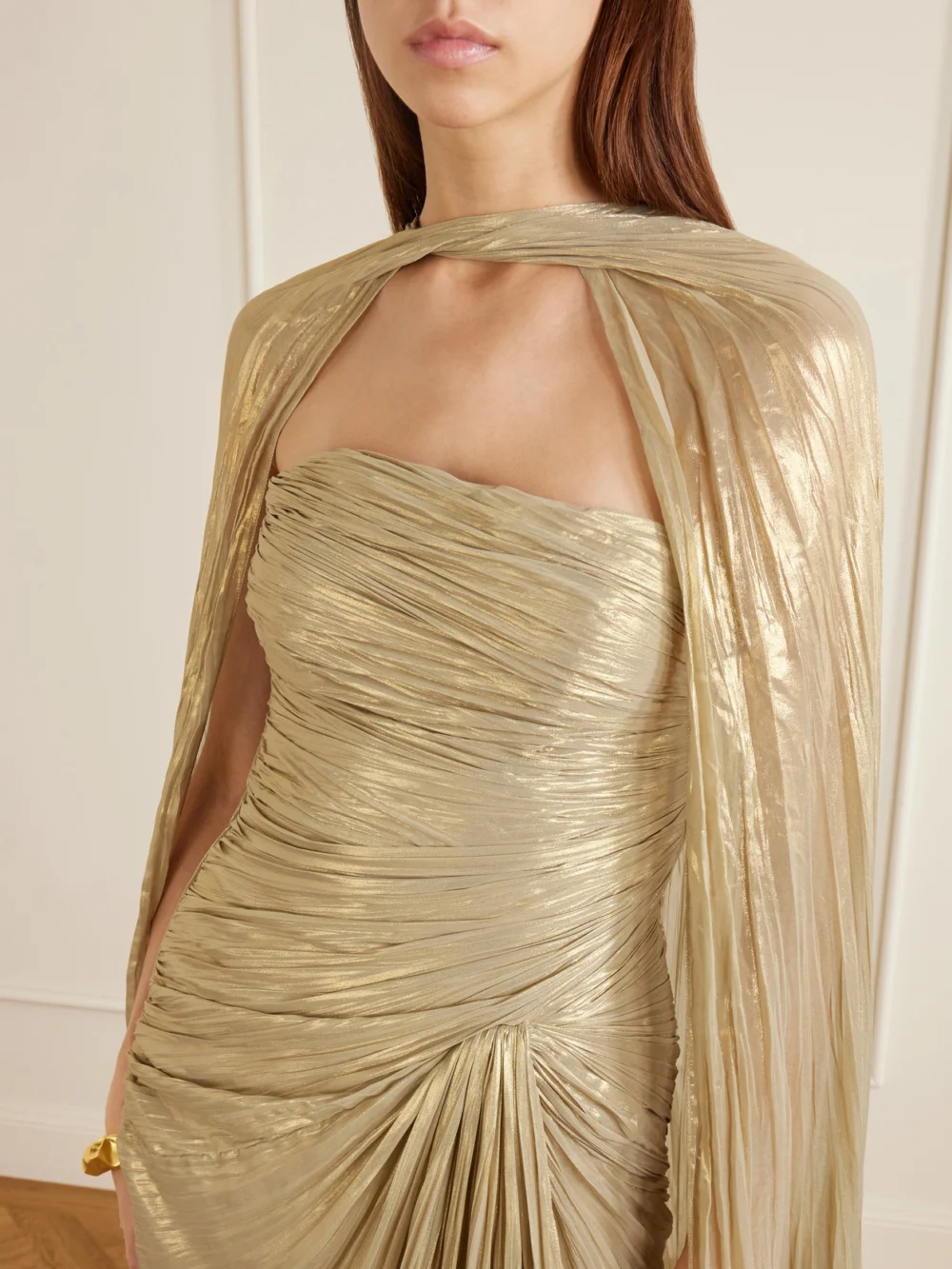 Close-up detail of the Marmar Halim Cape-effect Plissé Metallic-satin Gown