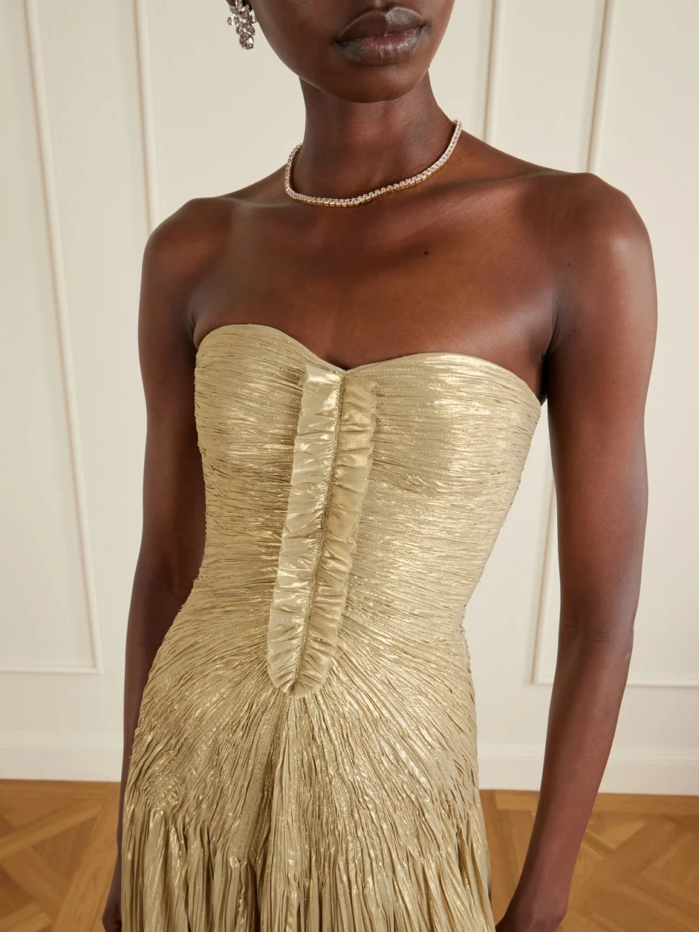 Close-up detail of the Marmar Halim Draped Pleated Metallic Silk-georgette Gown