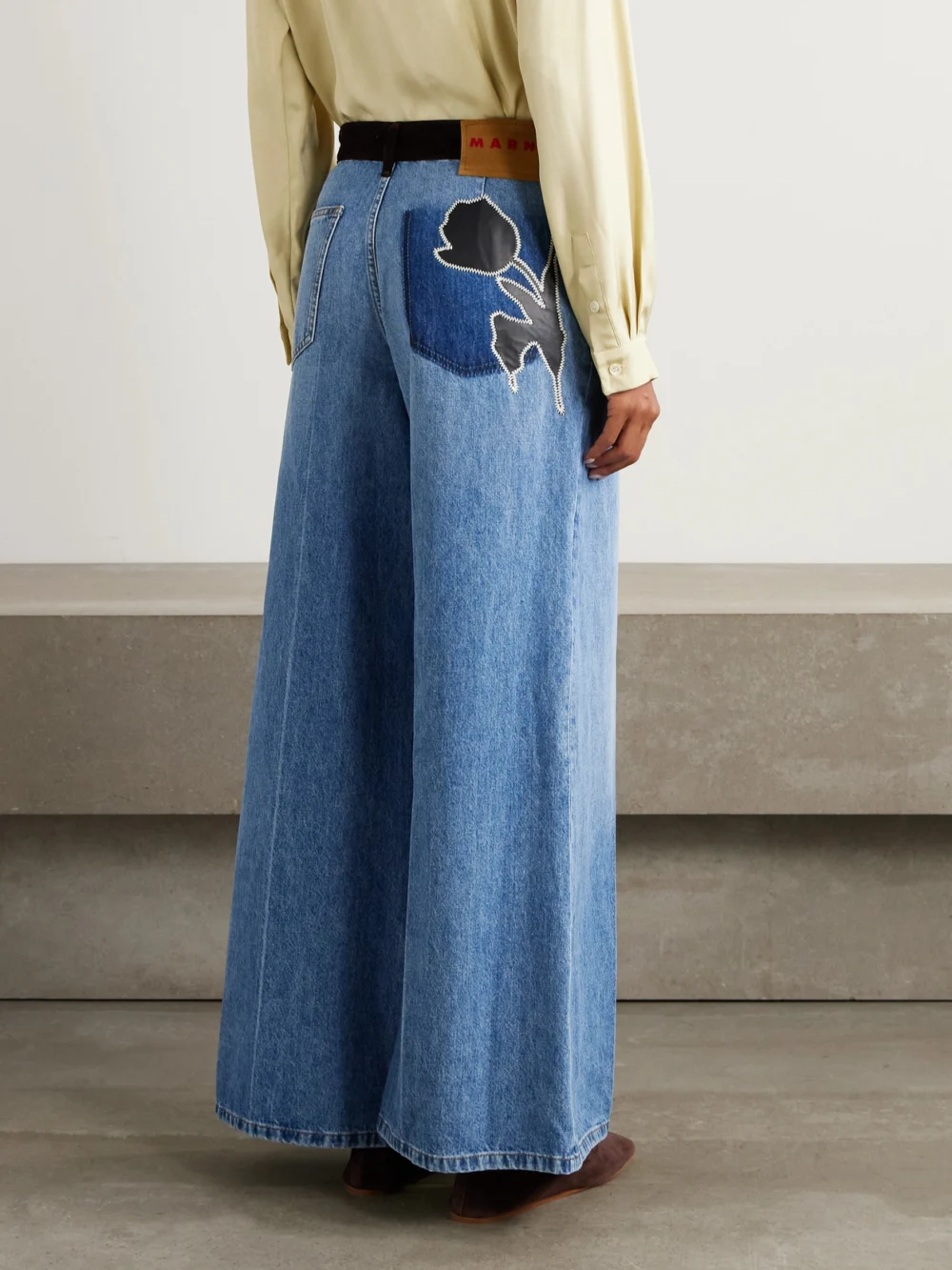 Back view of the Marni Appliquéd Velvet-trimmed Wide-leg Jeans