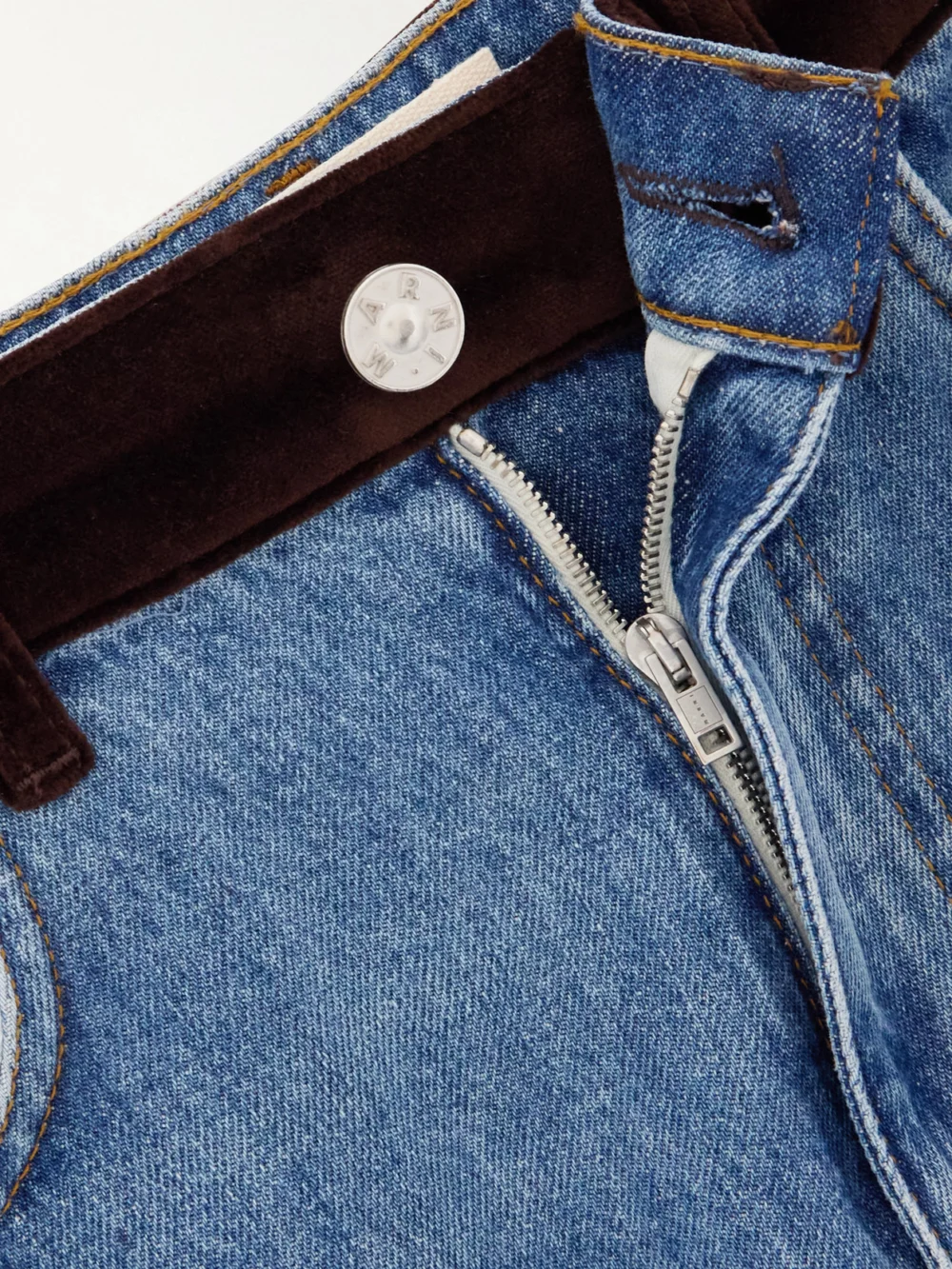 Close-up detail of the Marni Appliquéd Velvet-trimmed Wide-leg Jeans