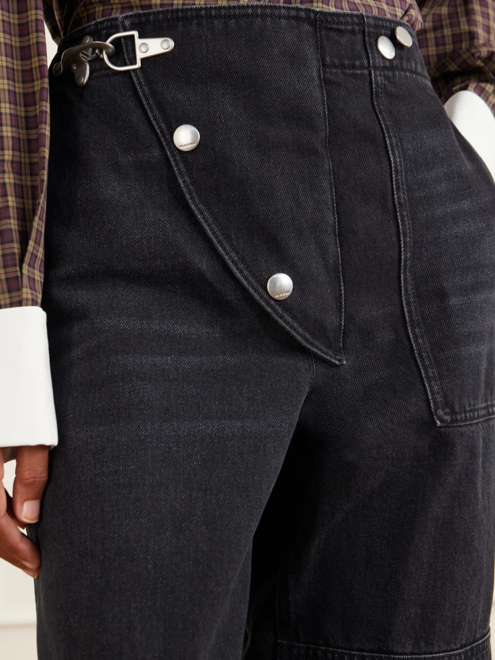 Close-up detail of the Marni Carabiner-hardware Asymmetric-fly Wide-leg Jeans