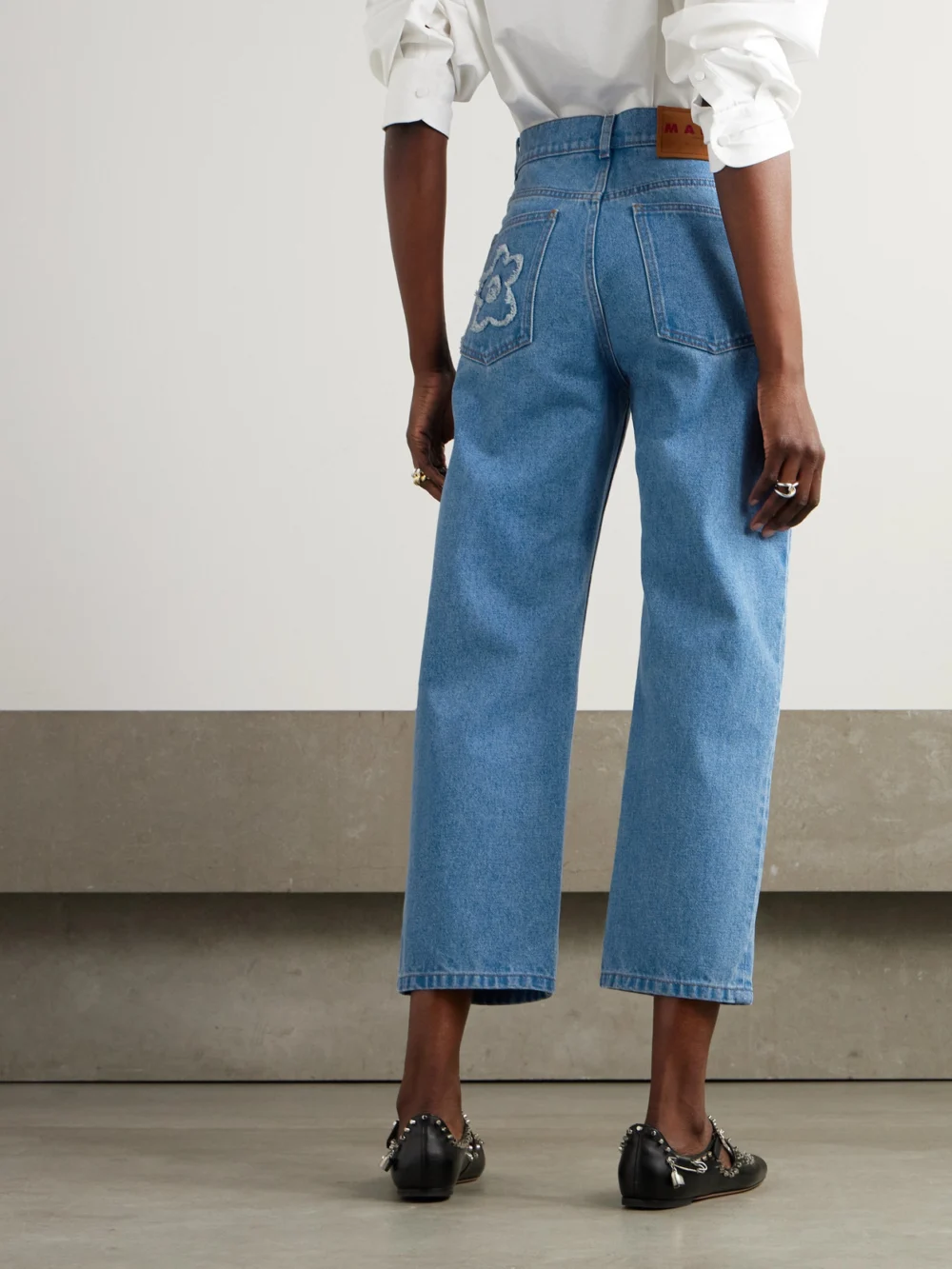 Back view of the Marni Cropped Appliquéd Mid-rise Straight-leg Jeans