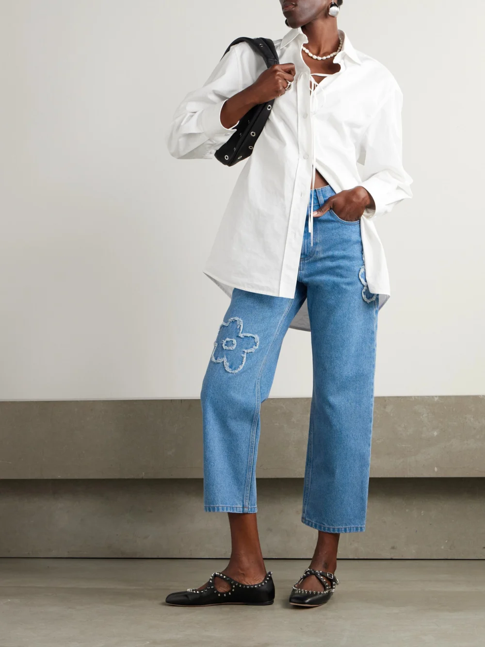 Marni Cropped Appliquéd Mid-rise Straight-leg Jeans, worn by a model
