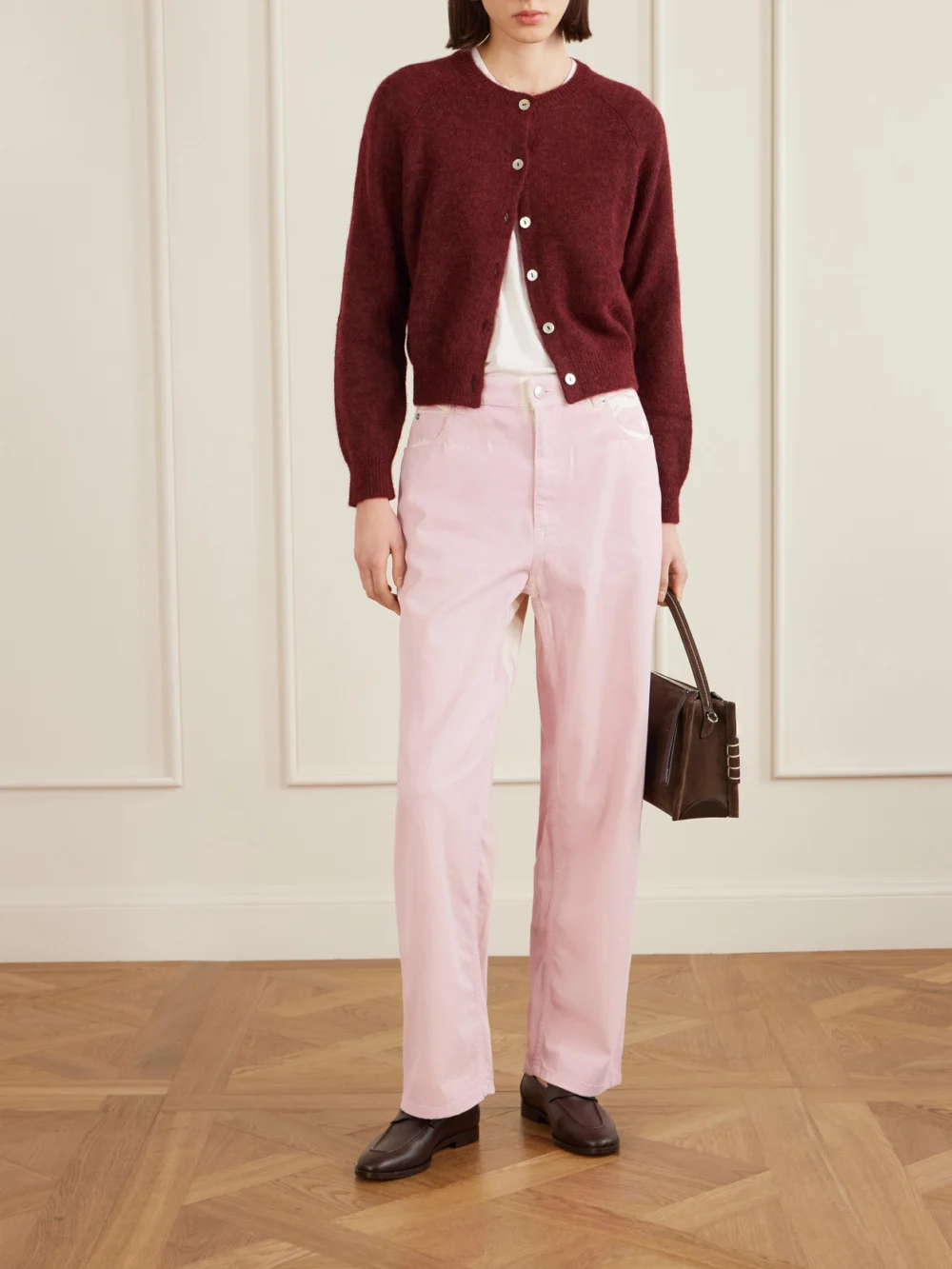 Marni Distressed High-rise Wide-leg Denim Jeans, worn by a model