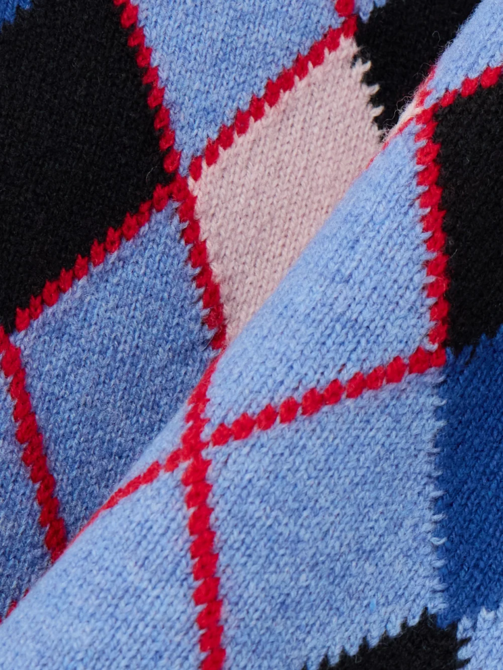 Close-up detail of the Marni Embroidered Argyle Wool Polo Shirt