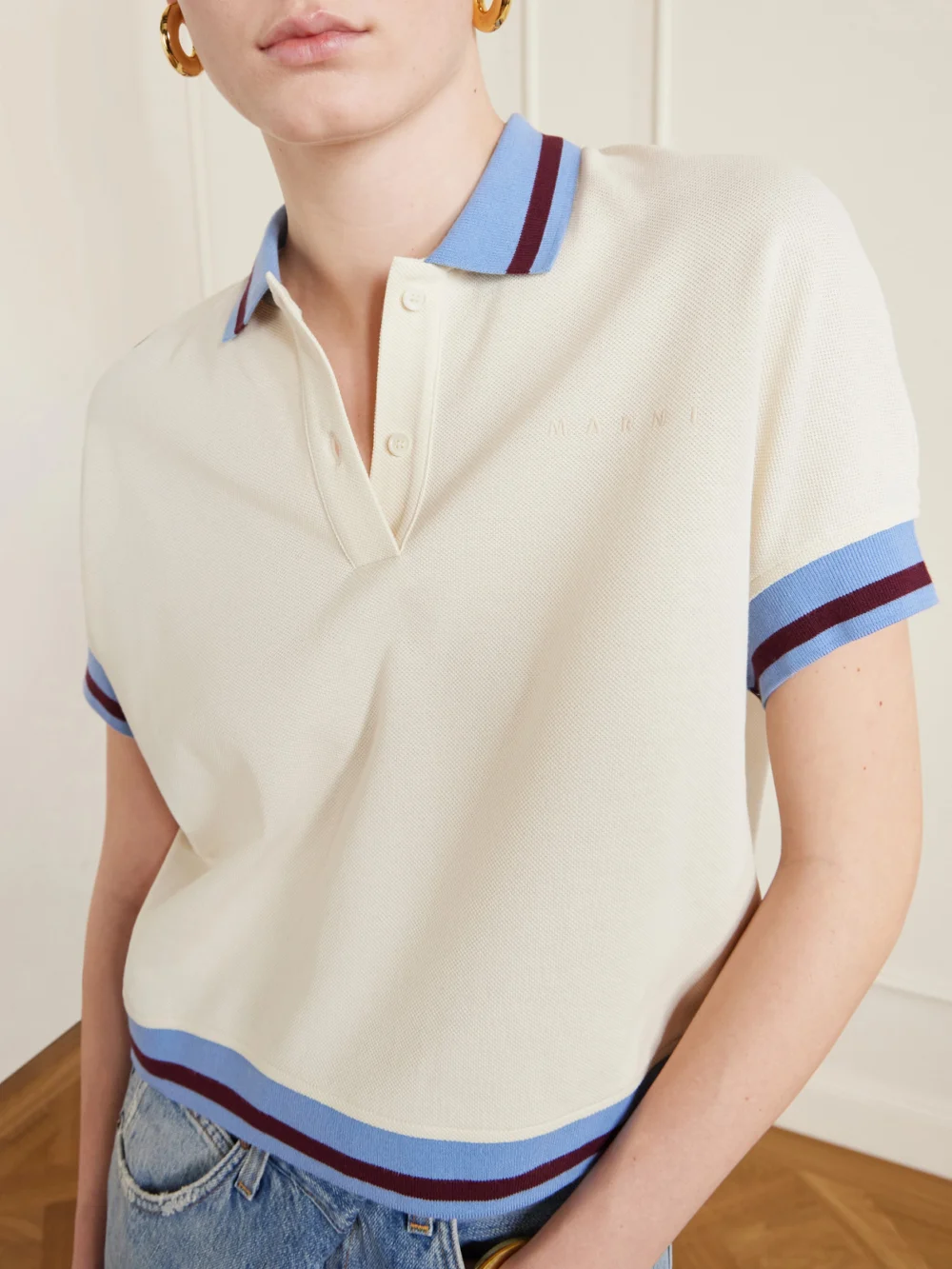 Close-up detail of the Marni Embroidered Striped Cotton-piqué Polo Shirt