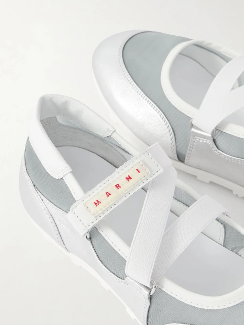 Close-up detail of the Marni Metallic Leather-trimmed Mesh Sneakers