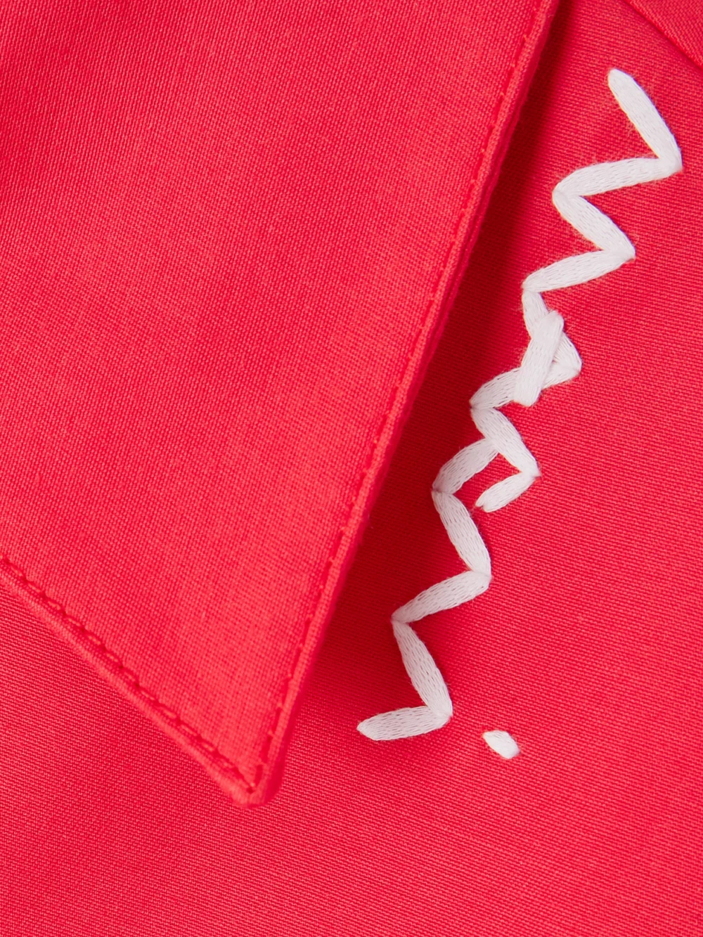 Close-up detail of the Marni Oversized Embroidered Cotton Mini Dress