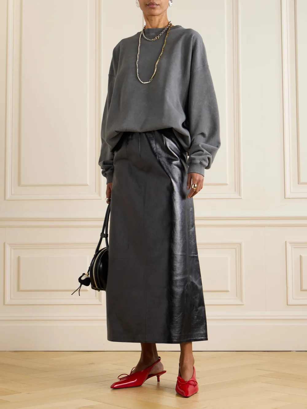 Marni Paneled Crinkled-leather Midi Skirt, worn by a model