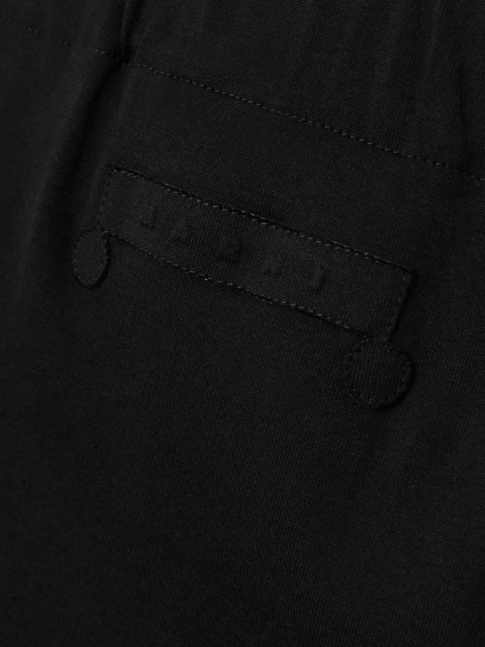 Close-up detail of the Marni Pleated Cotton-jersey Midi Skirt