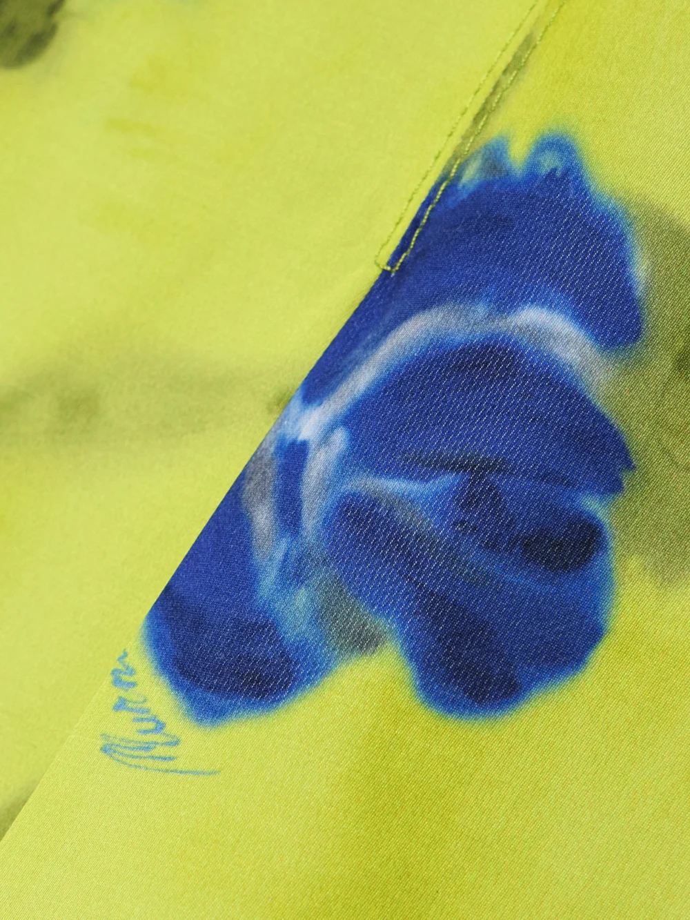 Close-up detail of the Marni Pleated Floral-print Sateen Midi Dress