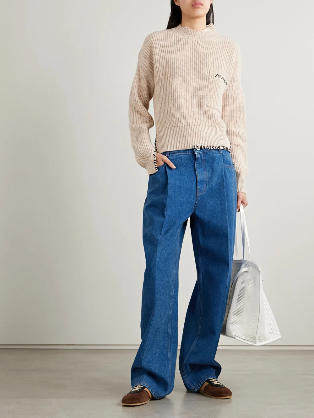 Marni Pleated Low-rise Wide-leg Jeans, worn by a model