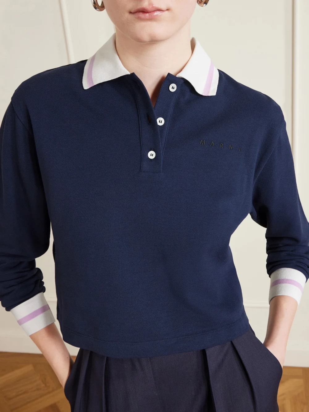 Close-up detail of the Marni Striped Embroidered Cotton-piqué Polo Shirt
