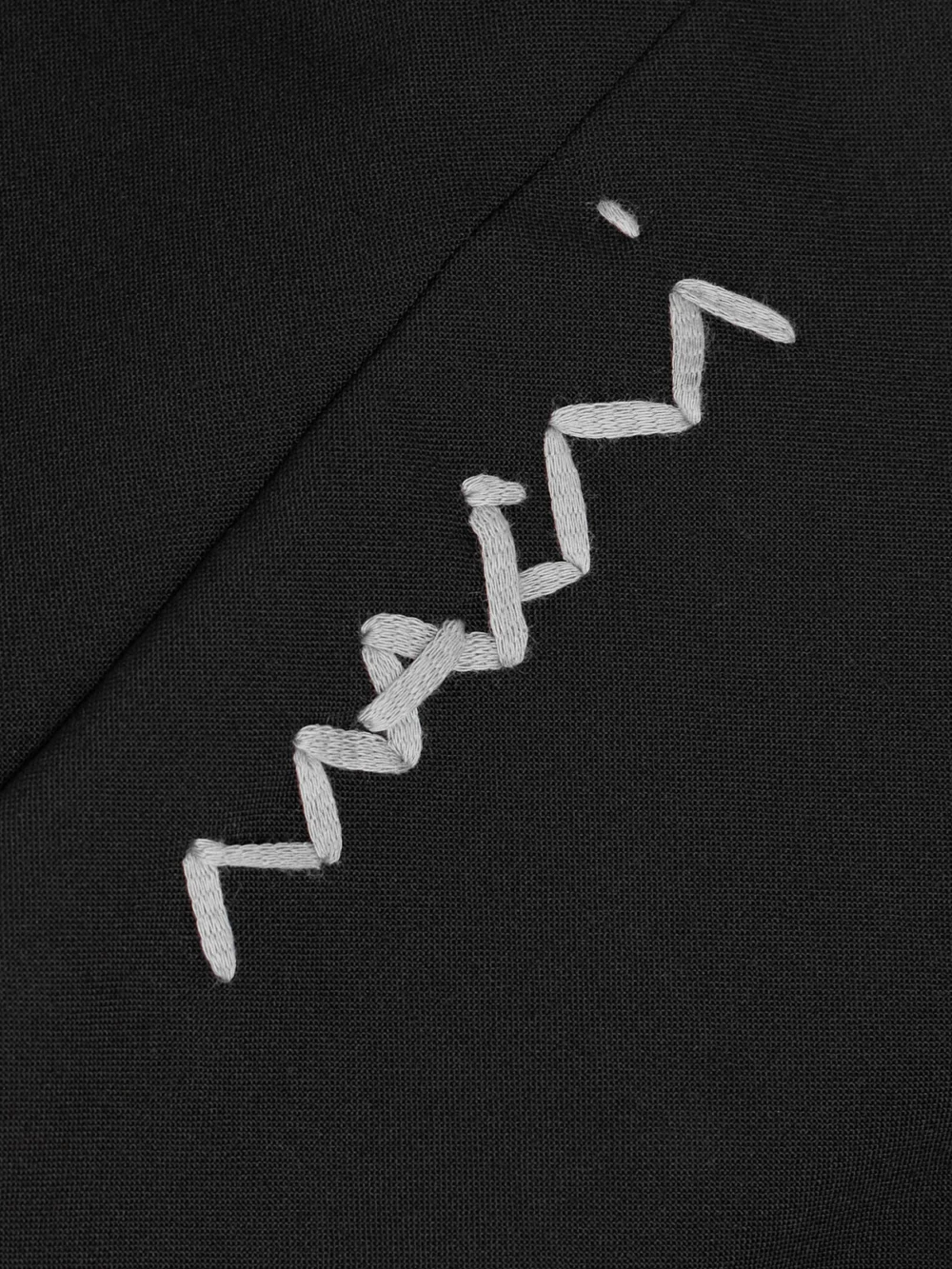 Close-up detail of the Marni Woven Straight-leg Pants