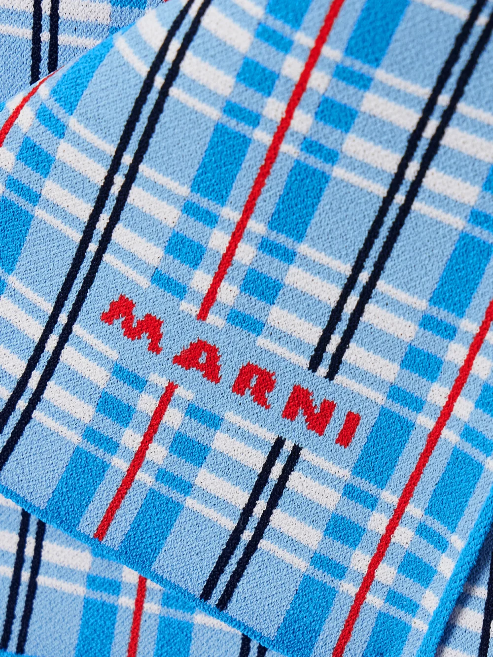 Close-up detail of the Marni Wrap-effect Checked Stretch-knit Mini Skirt