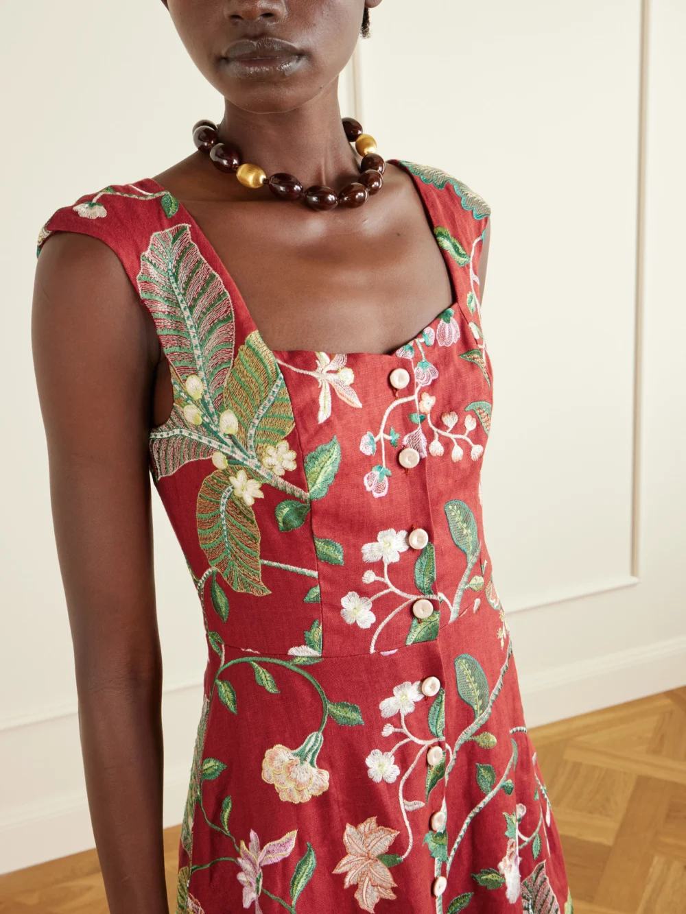 Close-up detail of the Marta Ferri Farfalle Embroidered Linen-blend Maxi Dress