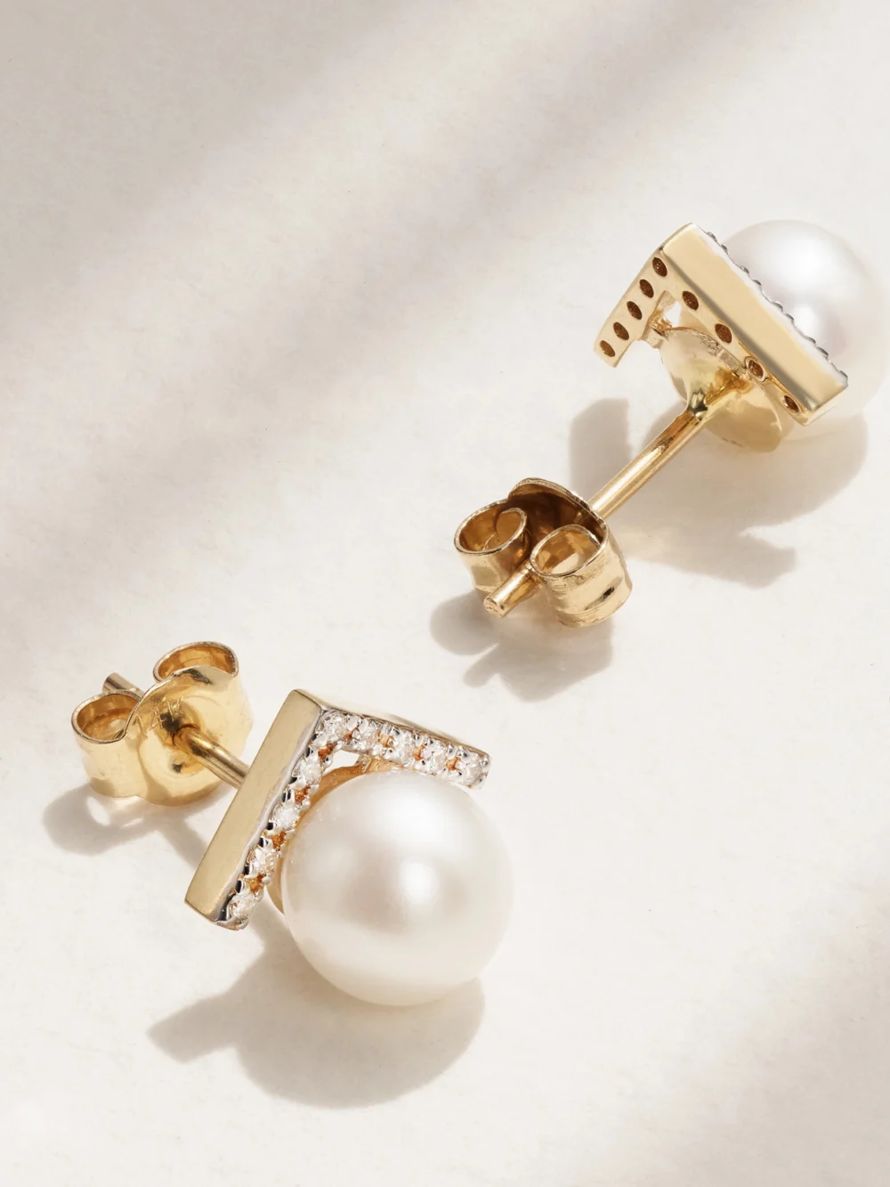 Close-up detail of the Mateo 14-karat Gold, Diamond and Pearl Earrings