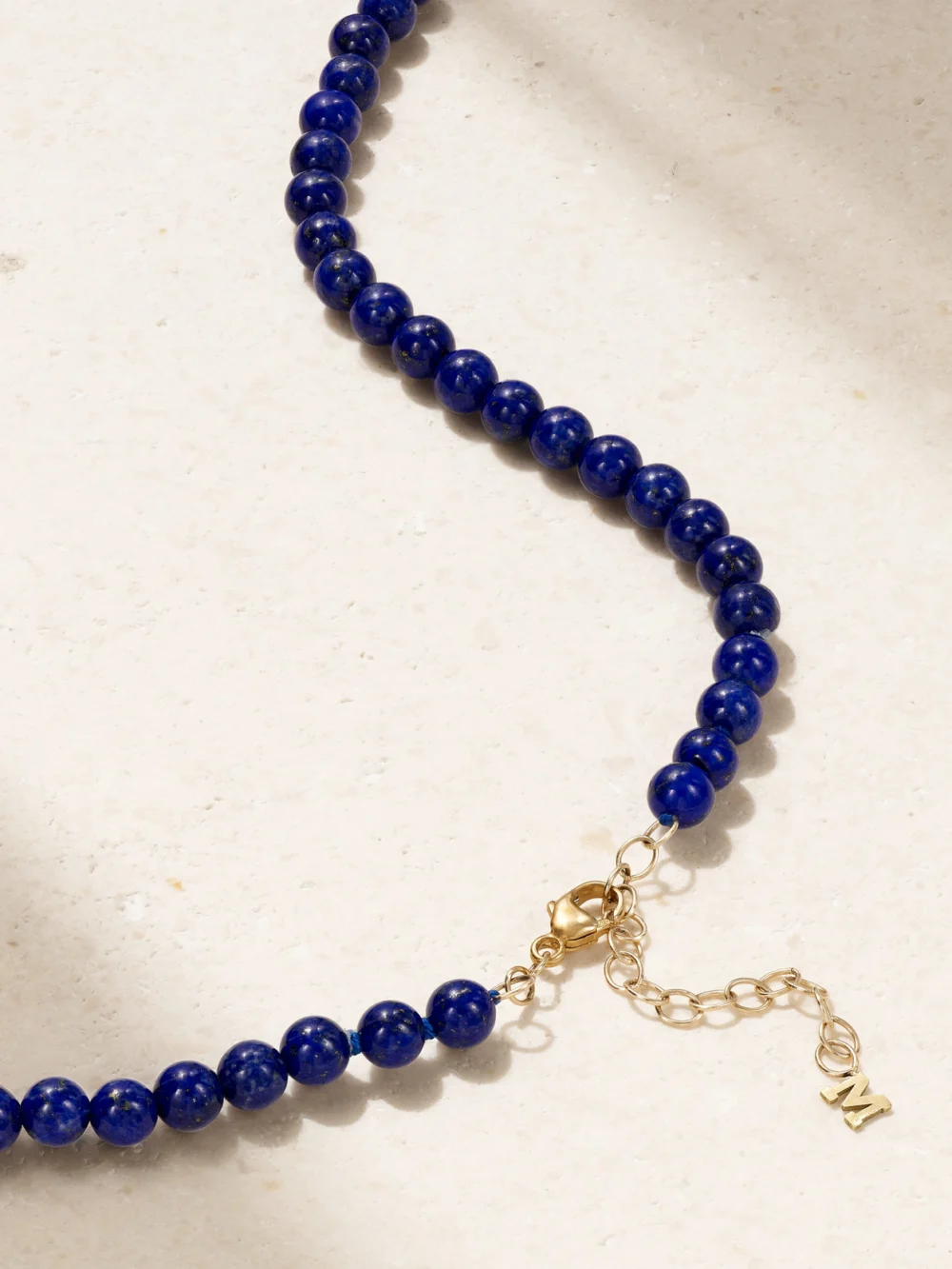 Close-up detail of the Mateo 14-karat Gold Lapis Lazuli Necklace