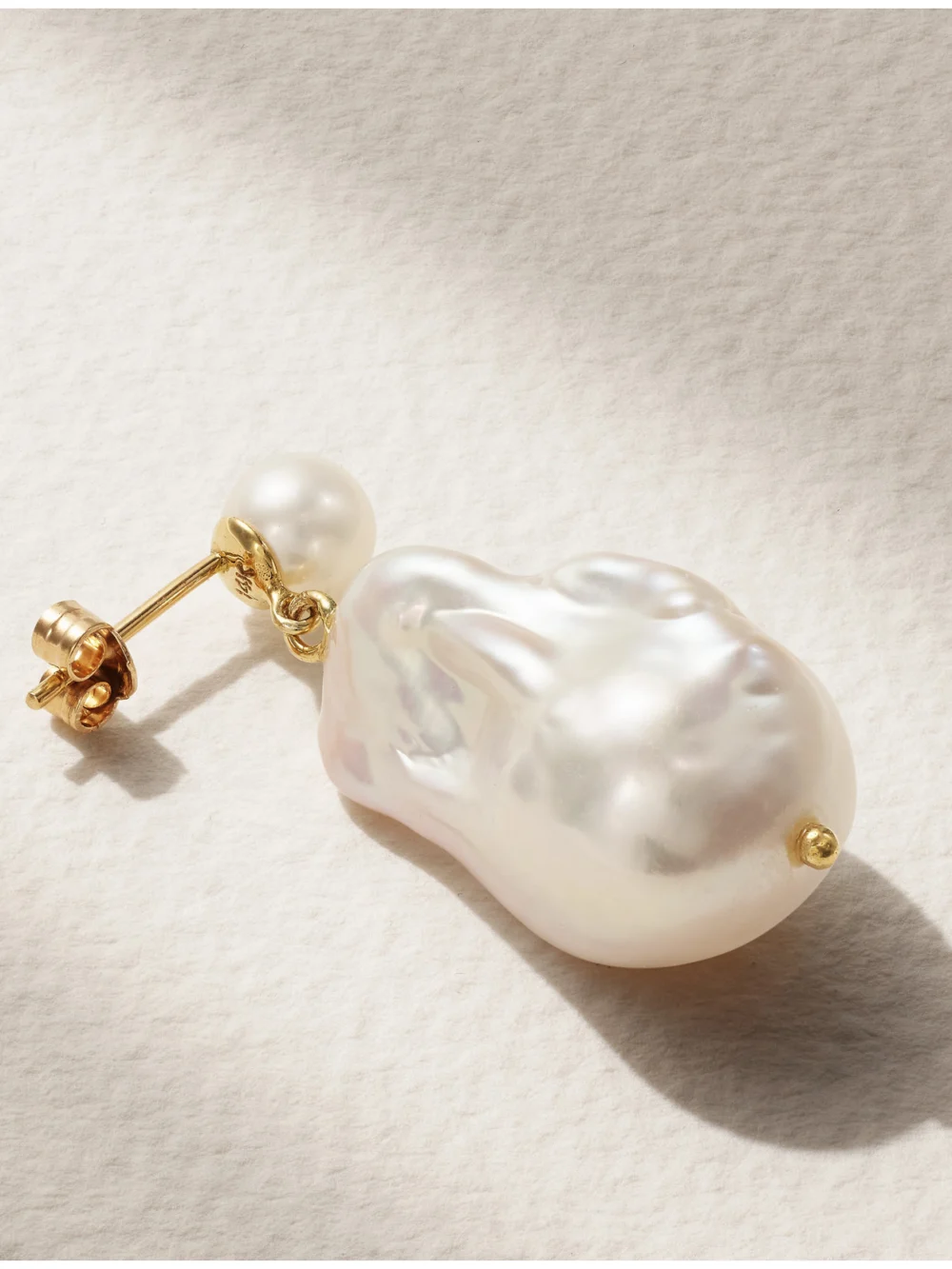 Close-up detail of the Mateo Duality 14-karat Gold Pearl Earrings