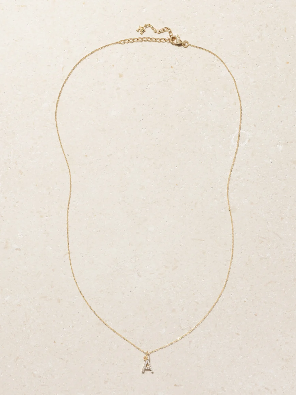 Close-up detail of the Mateo Initial 14-karat Gold Diamond Necklace