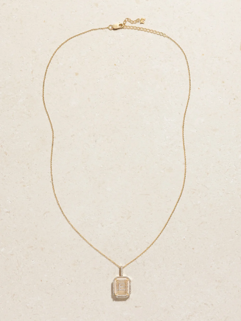 Close-up detail of the Mateo Initial 14-karat Gold, Quartz and Diamond Necklace