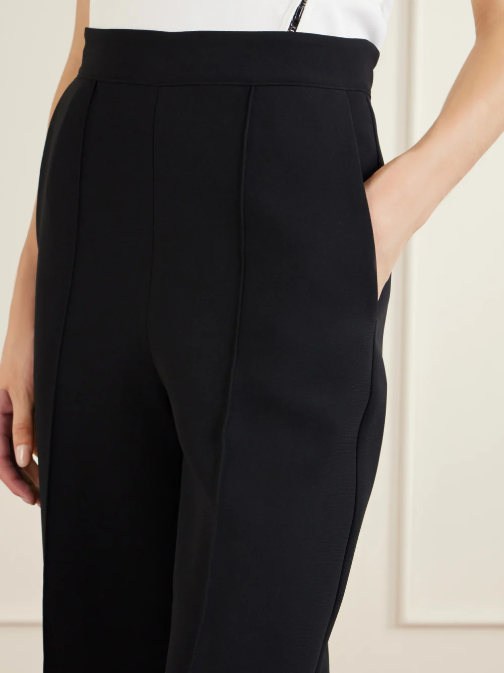 Close-up detail of the Maticevski Afterword Pleated Cady Straight-leg Pants