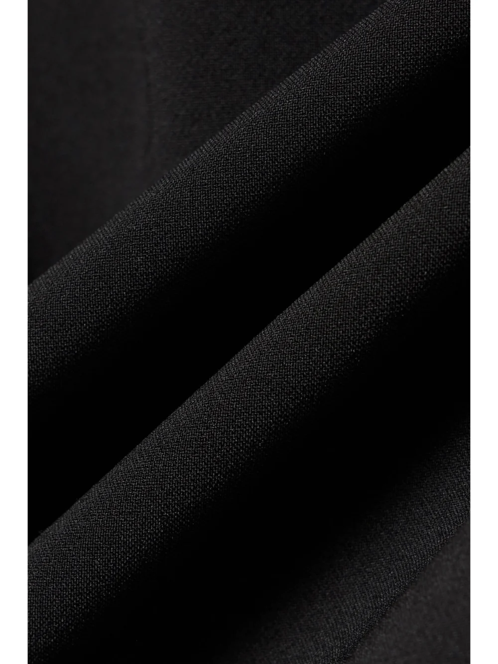Close-up detail of the Maticevski Aroma One-sleeve Stretch-crepe Mini Dress
