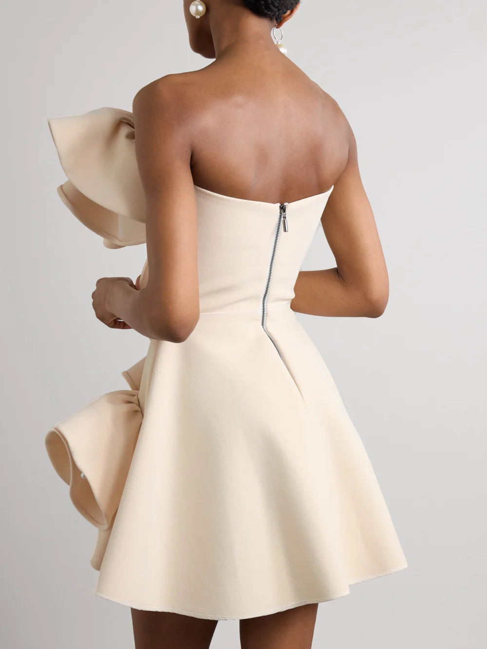 Back view of the Maticevski Atone Strapless Faux-pearl Embellished Ruffled Crepe Mini Dress