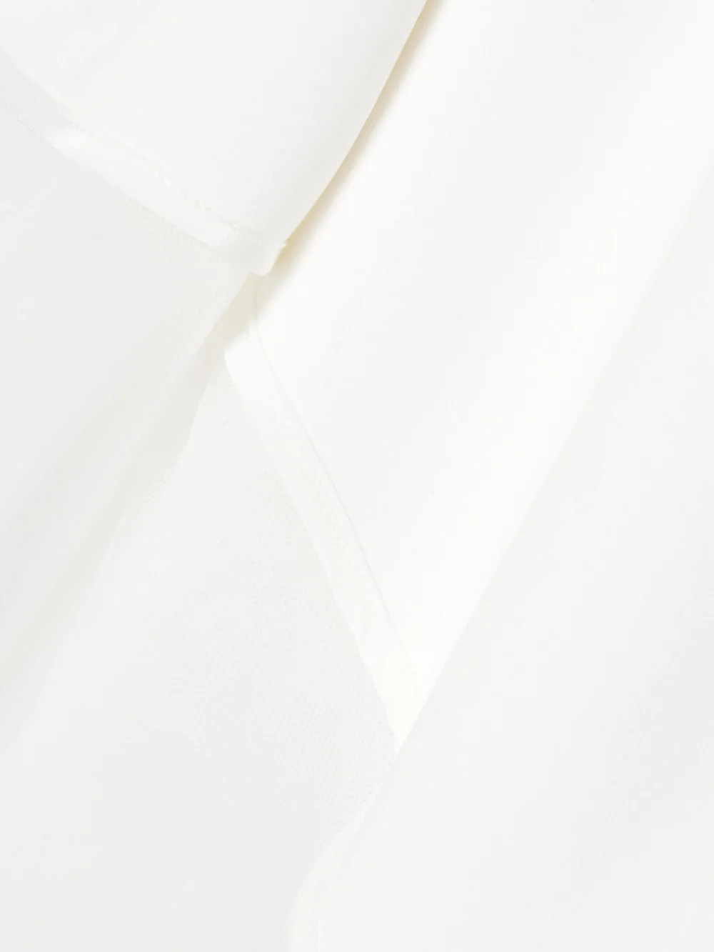 Close-up detail of the Maticevski Epitome Asymmetric Strapless Tulle-trimmed Cady Gown