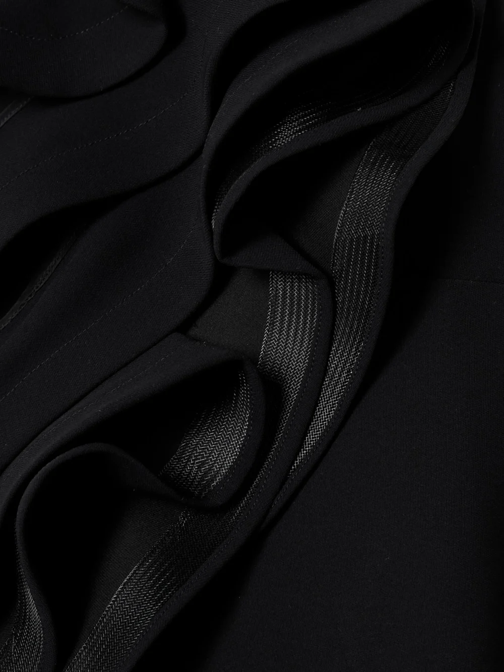 Close-up detail of the Maticevski Ironworks Strapless Mesh-trimmed Ruffled Crepe Gown