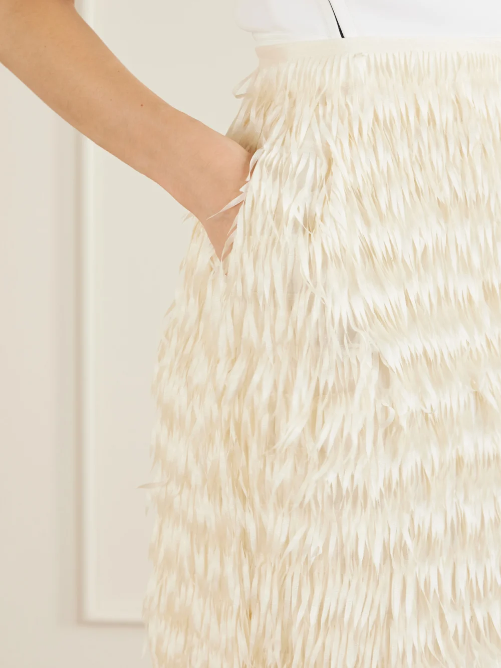 Close-up detail of the Maticevski Resonate Fringed Satin Midi Skirt