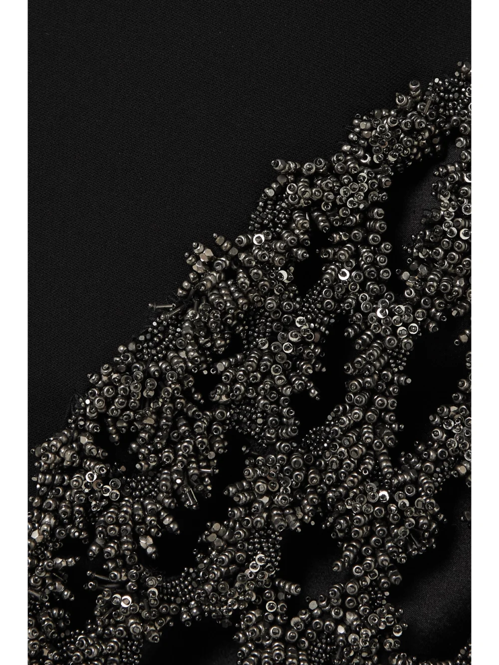 Close-up detail of the Maticevski Reveal Embellished Stretch-crepe Mini Dress