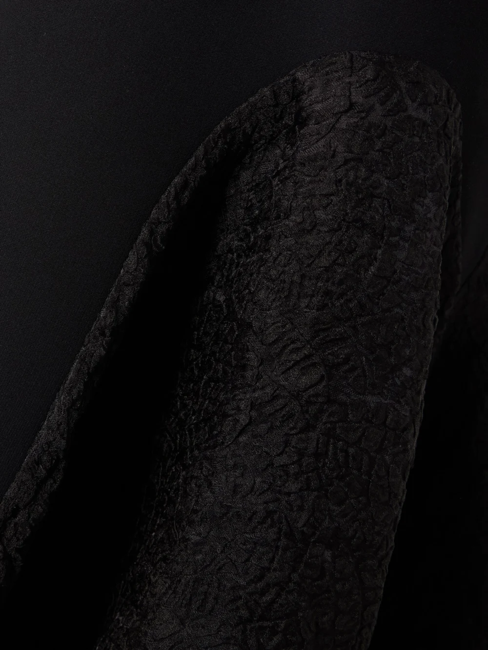 Close-up detail of the Maticevski Sybil Strapless Asymmetric Crepe and Crinkled-organza Dress