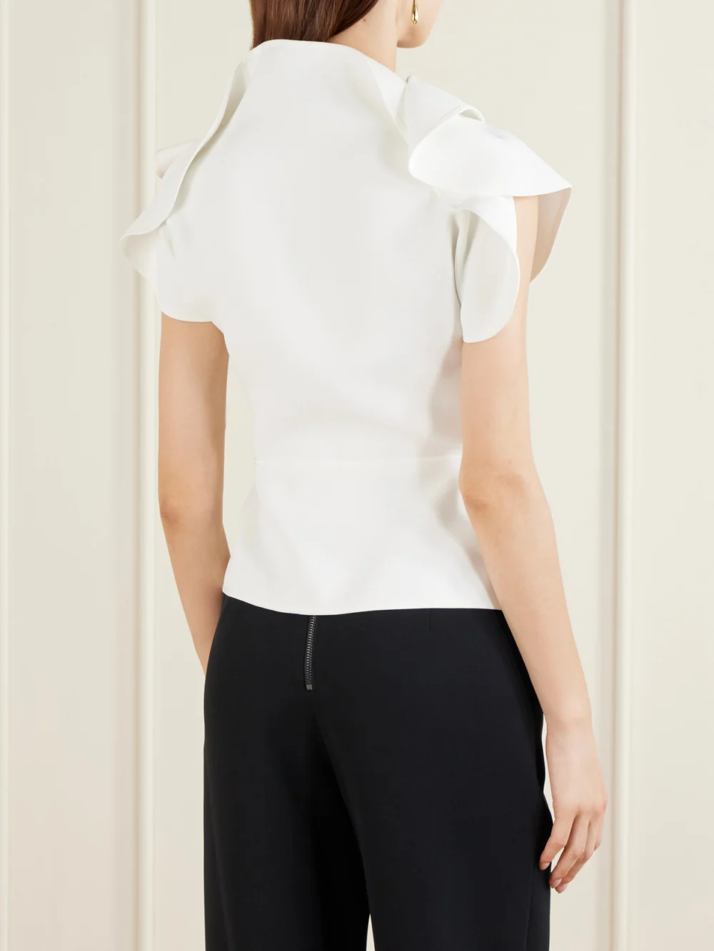 Back view of the Maticevski Whirl Asymmetric Layered Crepe Top